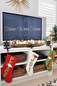 The one titled morning depicts children opening presents and retrieving stockings that are hung above the fireplace. 11 Creative Ways To Hang Christmas Stockings When You Don T Have A Fireplace Personalized Christmas Stockings