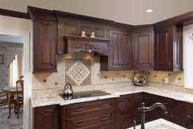 Select dark kitchen cabinets for your lowers and light kitchen cabinets for the uppers. This Beautiful Central Ohio Kitchen Remodel Is Tied Together By The Light Granite Countertops And Dark Brown Kitchen Remodel Light Granite Countertops Remodel