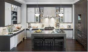 We loved the shade of the gray in this grey shaker kitchen cabinet! Mixed Media Kitchen Cabinets Gray And White Kitchen Grey Kitchen Designs Contemporary Kitchen