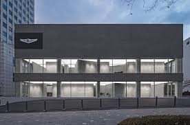 Designed For Intimate Discovery Oma S Hyundai Showroom Is Spatial Marketing Car Showroom Architecture Car Showroom Design Architecture