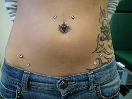27 creative tattoo and piercing combinations tattoos butterfly tattoo tattoos and piercings