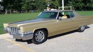 Image result for Medium Gold 1969 Cadillac