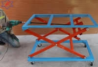 Use your drill and lift heavy objects with ease. Make An Adjustable Scissor Lift Table Homemadetools Net