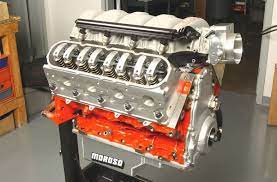 Heres What A 440 Cubic Inch Ls Engine Looks Like When Its All Buttoned Up And Ready For The Dyno Accessories Like The Water Ls Engine Crate Motors Car Ramps