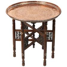 The stand only is for sale, last picture with the brass tray is for showing how it looks with the tray on top. 20th Century Moroccan Copper Tray Table With Folding Base Tray Table Copper Tray Moroccan Table