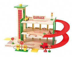 Awesome Little Garage Set For Children By Moulin Roty Shopping Design Modern Woodentoygarage Wooden Toy Garage Toy Garage Wooden Garage