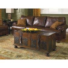 Visit the signature design by ashley store. Mckenna Storage Cocktail Table By Ashley Furniture Steamer Trunk Coffee Table Wood Wood Cocktail Table Coffee Table Trunk