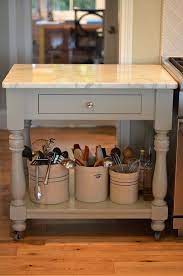 It offers simple design features, industrial fittings, and a contrasting white marble countertop. Rolling Cart Kitchen Island On Wheels Kitchen Marble Top Kitchen Island Cart