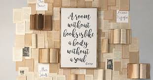 Would You Put Book Pages On Your Wall This Decor Trend Has People Seriously Divided Book Wall Art Book Wall Organization Hacks