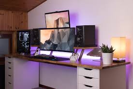 We decided to use three 80′ tall cabinets, two 24″ base cabinets and two 24×30″ wall cabinets. Custom Ikea Desk With Monitor Riser And Cable Passthru Album On Imgur