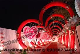 A Heart Shaped Entrance To The Wedding Venue Heart Shape Wedding Marriage Decoration Wedding Planning Company