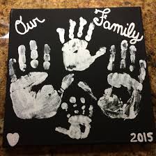 Black And White Canvas Family Photos Family Handprints White Acrylic Paint On Black Canvas Family Hand Prints Diy Canvas Art Black Canvas Paintings