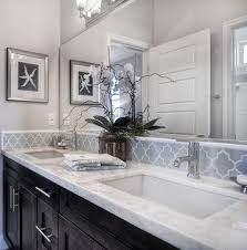 In this space, designer andreas charalambous chose slim glass tile in calming shades of brown and beige, complementing the wenge countertop and floating display boxes. 82 Bath Backsplash Ideas Bathroom Design Bathrooms Remodel Bathroom Backsplash