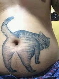 Obviously he meant that the tattoo looks like legs and the belly button is where the *cat emoji* would be. King Grim Gts Heavyweight Champion On Twitter Best Belly Button Tattoo Ever