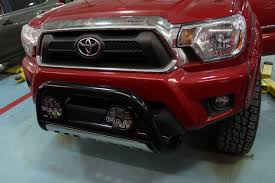 Piaa Lights And Bull Bar On Toyota Tacoma In Barcelona Red Toyota Trucks Bull Bar Toyota Tacoma