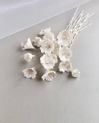 Maybe you would like to learn more about one of these? Bridal Hair Pins With Small White Flowers Wedding Hair Piece Etsy White Flowers Wedding Hair Wedding Flower Hair Pieces Bridal Hair Pins