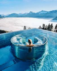 27 Outdoor Hot Springs Tubs Pools To Warm Up Your Winter Travels Hotel Villa Honegg Travel Vacation