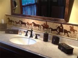 There are so many fun accessories you can add to the bathroom that allows you to make it a beautiful, bold western space. Western Wildlife Tile Ideas Kitchen Backsplash Bathroom Shower Bathroon Surround Shower Surroun Western Bathroom Decor Western Bathroom Western Bathrooms