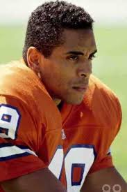 Coach Dan Reeves introduces USC's Dennis Smith as the Broncos 1st draft  pick in the 1981 draft.