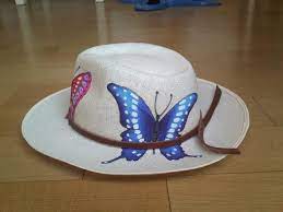Butterflies On Hatstraw Hatfedora Hathandpainted Hatshand Etsy In 2021 Painted Hats Hand Painted Hats Summer Hats Beach