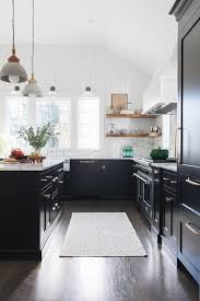 10 black kitchen area closet concepts for stylish chefs. White Range Hood With Black Cabinets Cottage Kitchen