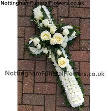 This beautiful sympathy rose spray is wonderful floral tribute shows your faith, hope and love during this difficult time. White Cross Funeral Tribute Funeral Flowers Nottingham
