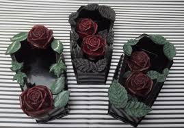 Is the merriwick flower real : Merriwick Crafts Deep Red Roses Coffin Ornament With Leaves
