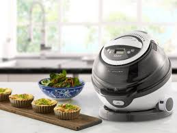 This 130 Air Fryer Looks Like A Basketball On A Little Stand I Tried It And It Tilts And Rotates To Ensure Even Cooking Air Fryer Healthy Just Cooking Best Air Fryers