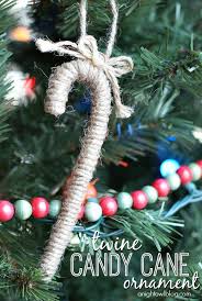 How to make peppermint candy ornaments. Diy Twine Candy Cane Ornament A Night Owl Blog Christmas Diy Handmade Christmas Diy Christmas Ornaments