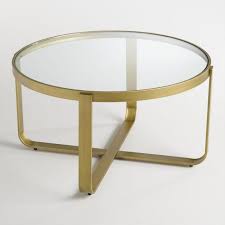 Smart brass coffee table with black marble top. Ilene Round Glass Brass Coffee Table