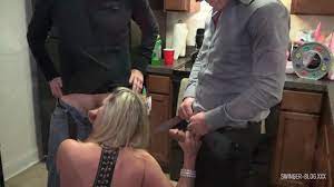Hot blonde housewife giving double BJ at and exclusive amateur swinger sex  party watch online