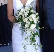 Find the best wedding florists in your area and get a great deal with bark Beautiful Cascading Bridal Bouquet With White Calla Lilies White Roses White Bride Bouquets White Cascading Bridal Bouquets White Cascading Bridal Bouquets