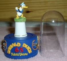 Originally, my dust ruffle covered them. Disney Donald Duck Holding A Baton Fingerhut Feisty 65 Yrears Stander Dome Ebay