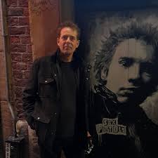 Pool Hayes Lane, Willenhall. Two fellas in St George's masks painting St  George's flags