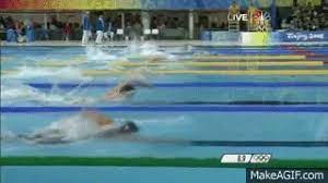 Missy franklin balancing a water bottle on her head while swimming to practice head stability during her backstroke gif literally. Michael Phelps Swimming Gif