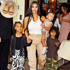 Previously, kim told elle magazine that she was on the fence about having a fourth kid with kanye, and that if they did, it would be their last. Kim Kardashian S Kids Try On Yeezy Sandals In New Instagram Video