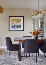 Helena dining room set wooden brown dining table with matching upholstered chairs set on a light gray rug in a room with sunny beige walls. 75 Beautiful Gray Dining Room Pictures Ideas July 2021 Houzz