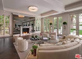 This living room has plenty of practical perches, thanks to its ample sectional and hanging pod chair. 15 Luxury Living Room Designs Stunning Home Stratosphere
