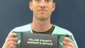 Man accused of threatening own children and Divide grade school had six  guns, ammo and mystery Mason jar