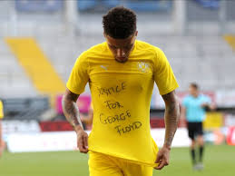 Join the discussion or compare with others! Video Jadon Sancho Reveals Justice For George Floyd Shirt
