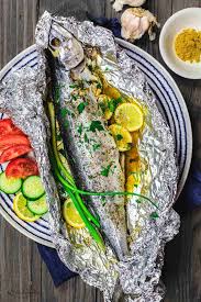 Mediterranean Oven Baked Spanish Mackerel Recipe The Mediterranean Dish Easy Greek Inspired Recipe Whole Fish Recipes Mackerel Recipes Whole Mackerel Recipe