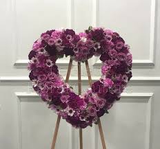 Without enough greenery the wires are exposed. Deepest Faith Sympathy Heart In Santa Fe Springs Ca Le Fleur Floral Couture