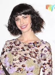 Kimbra Hairstyles Short Black Curly Hairstyle With Bangs Hairstyles Weekly Curly Hair Styles Medium Curly Hair Styles Short Curly Hair Black