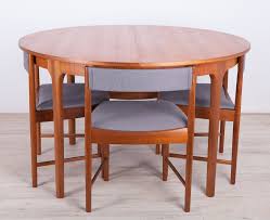 After wwii ships returned from asia with as much teak as they could, not wanting to return without goods. Mid Century Teak Dining Table Chairs Set From Mcintosh 1960s 118968