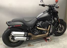 Blacked out surfaces, spoked wheels, hidden digital instrumentation, forward controls. Harley Street Bob Custom Seats Hobbiesxstyle