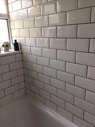 Télécharger white metro tiles with grey grout. White Tiles With Dark Grout Anyone Done This Mumsnet Discussion White Tiles Grey Grout White Tile Shower White Bathroom Tiles
