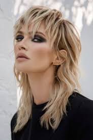 Katie Woessner-Carrera (katieloveco)