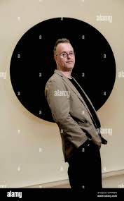 Artist, Alan Begg with his sculpture, 23.5*(degrees),