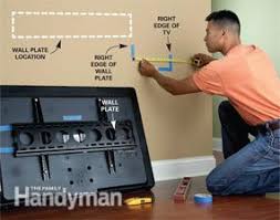 Secure the brackets to the mount on the wall. How To Wall Mount A Tv Diy