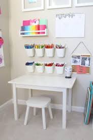 Baby Playroom Ideas With Box And White Table And Chairs Also Photo On The Wall Pastel Playroom Baby Playroom Girl Room